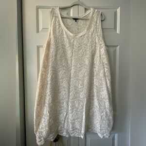 Cream knit with slip lined sleeveless dress.